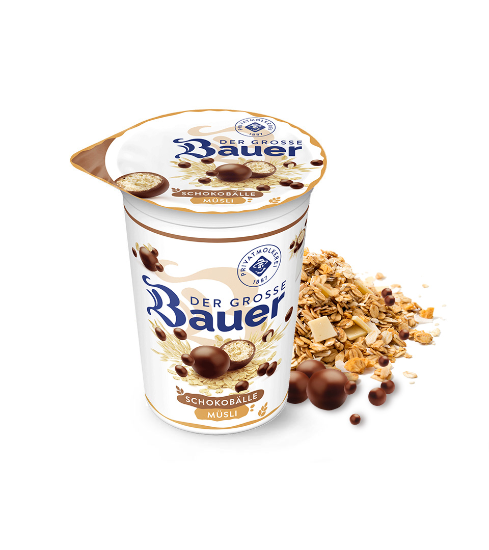 /assets/01_Milchprodukte/Joghurt-Trinkjoghurt/01-Der-Grosse-Bauer/Produktimage/Muesli-225g/bauer-natur-joghurt-trinkjoghurt-muesli-schokobaelle.jpg